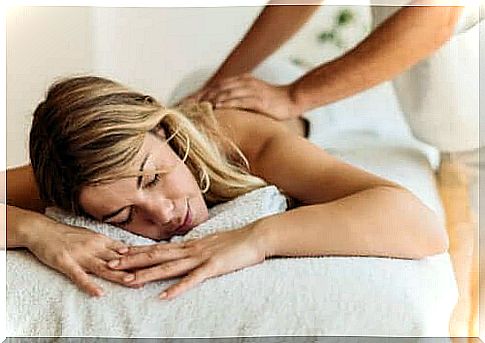 Woman doing massage with professional