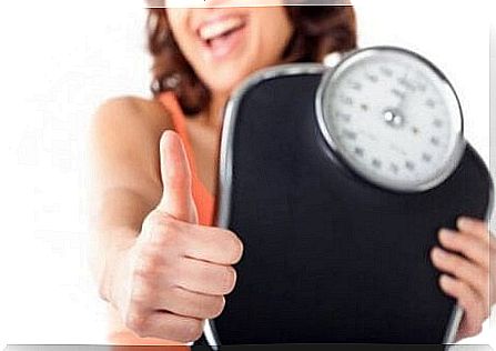 woman happy with her weight