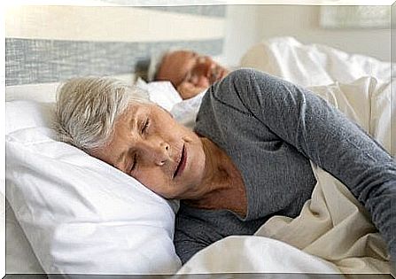 elderly couple sleeping