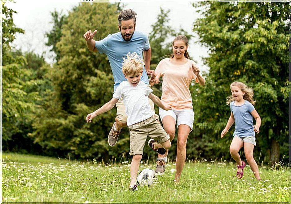 father spending time with family in the garden