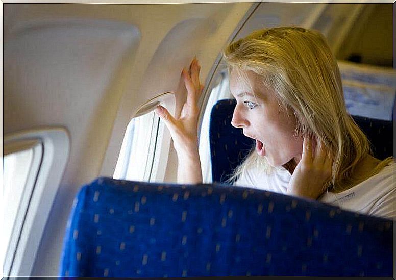 Woman overcoming her phobia of flying