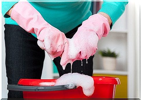 Woman washing with hair conditioner to prevent clothes from shrinking